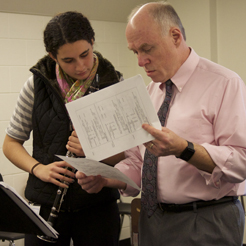 Dr. Sylvern helps a student improve her technique.