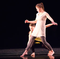 KSC dancers Gabriella Pacheco (standing) and Samantha Sampaio in Alexander Davis’ “Slight Displacement” at the ACDA festival.