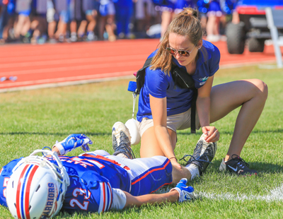 Mikaela Harding ’14, head athletic trainer at Winnacunnet High School. (Matt Parker Photo)