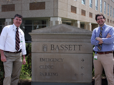 Travis Hodgdon ’94 (left) and Dan Filitis ’01 at the Bassett Medical Center, where they met and shared their favorite Keene State stories.