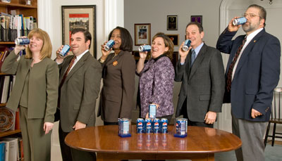Mark Corliss, (From left) Amelia Carney (Pepsi), Paul Paltrineri (Sodexho), President Helen Giles-Gee, Denise Richards (Pepsi), Jay Kahn (Finance and Planning) and Jim Draper (Purchasing) take a centennial Pepsi sip on Tuesday, February 11.