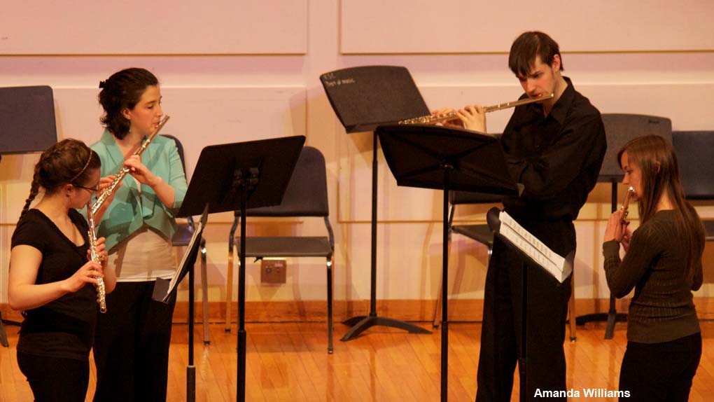 Students perform classical chamber music at the concert.