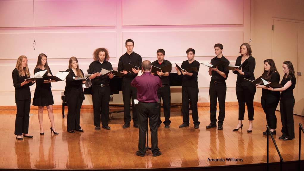 KSC faculty member Matthew Leese conducts the Vocal Consort.