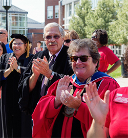 Keene State President Anne Huot clapping in our new first-years