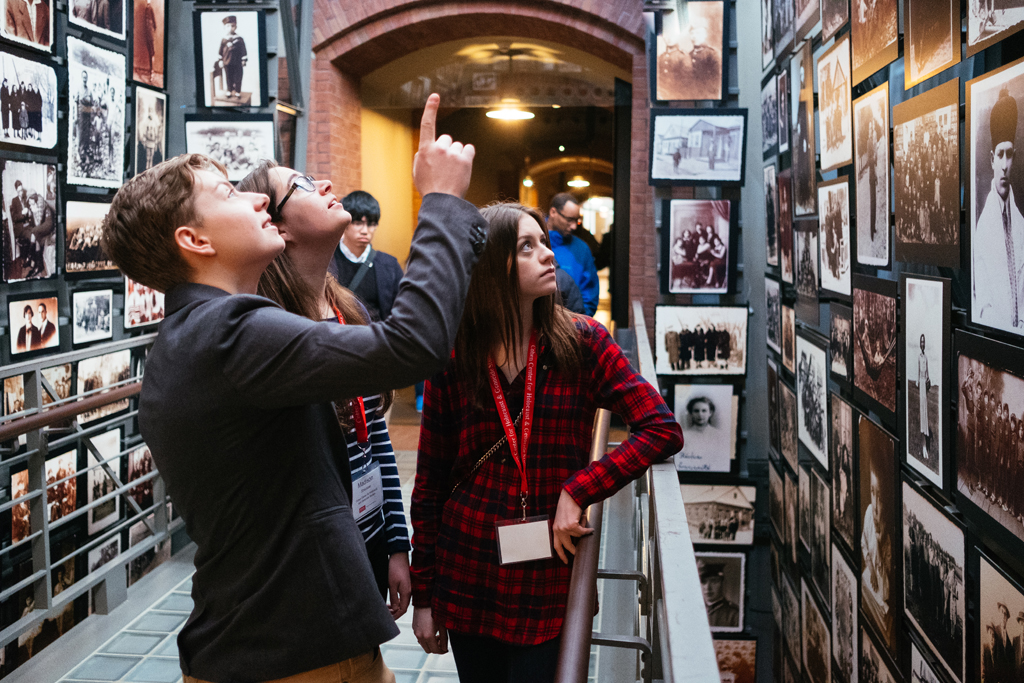 Seniors Galen Gammino and Madison Strausser get a history lesson from Emily Robinson ’16 at the United States Holocaust Memorial Museum in Washington, DC. Photo by Will Wrobel