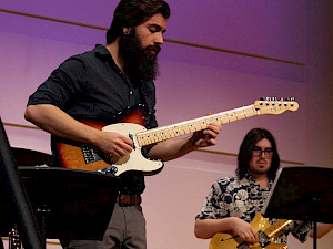 Guitar Ochestra is led by Jose Lezcano.