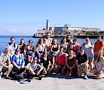 The Keene State travelers in front of Morro Castle along the Malecon in Havana. (First row, l–r): Dr. Cusack, Lisa Donelly, Brendan Felix, Dr. Mullens, Gwen Thayer, Alexandria Sebado, Grant Martineau, Julia Przekaza (second row, l–r): Tyler Chaisson, Samantha Buckler, Lucy Smith, Corinne Colgrove, Cameron Cummings, Kayla Worrall, Ashley Hoffer, Veronica Spadaro, Caitlin Levasseur, Sarah Shufelt, and Joey Hadges.
