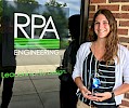 Taylor Warriner ’15 with her Innovation Award from RPA Engineering
