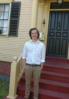 Tyler Croteau at the entrance to the Wyman Tavern