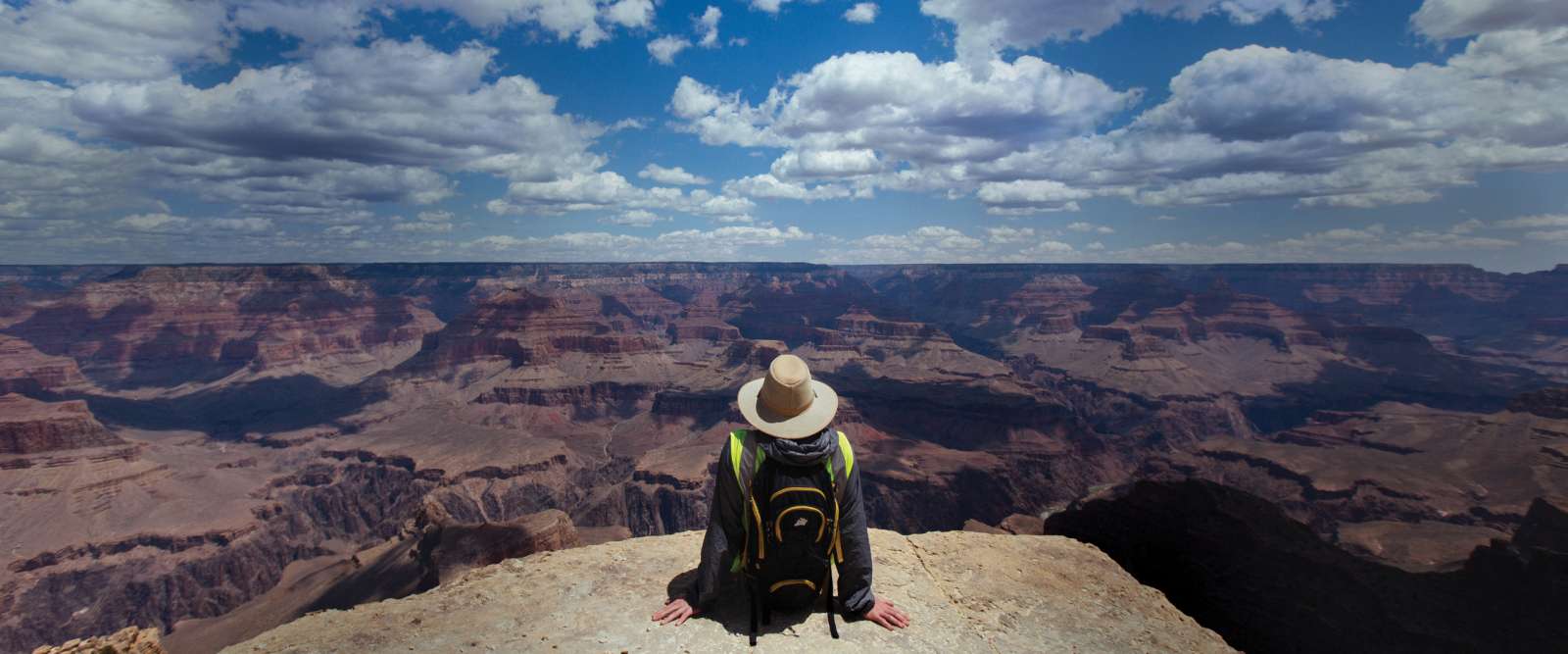 Hiker overlooks Grand Canyon