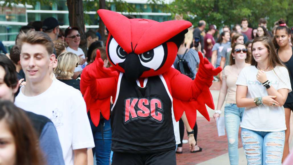 Hootie leads first-year students down Appian Way during Clap-In in August