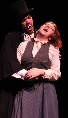 Keene State Theatre and Dance students (from left) Dan Kuhn of Keene, N.H., and Taylor Ewing of Hudson, N.H., rehearse a scene from *Dracula*.