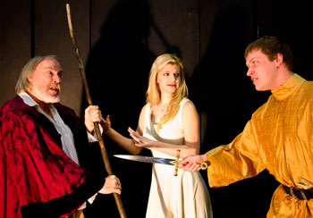 Keene State Theatre actors (from left) Dan Patterson of Keene, N.H., as Prospero; Ryan Connell of Greenfield, Mass., as his daughter, Miranda; and Aaron Howland of Winchester, N.H., as Ferdinand rehearse a scene from *The Tempest*.