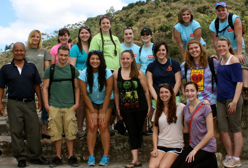 The gang on the grounds of San Francisco Church in Antigua. Back row: Devon Wilson, Jessica Gagne Cloutier, Caroline Hall, Alyssa Tremblay, Kenny Faria, Katelyn Williams, Addy Parsons, Kevin Coles Front row: Local guide, Cameron Haggar, Kya Roumimpour, Michelle Brahen, Jessica Lambert, Kateland Dittig, Hannah Gagnon Kneeling: Lisa Bryant, Taylor Ciambra