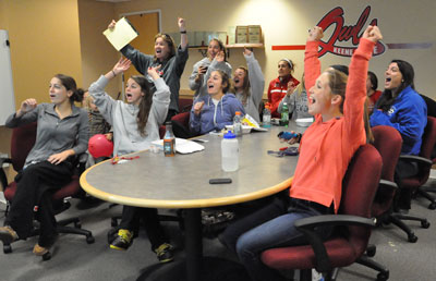 Women’s Soccer Players and Coach Lyons react while watching NCAA Tournament selection show