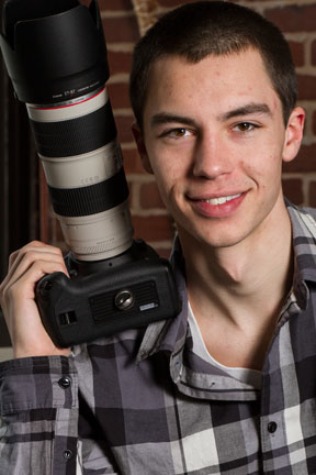 Lee Germeroth, a management major, will start a full-time job in social media marketing at Paragon Digital Marketing in Keene, where he held an internship during the spring semester. Photo by Brian Cantore '14