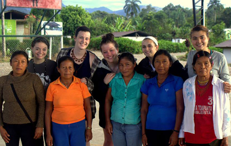 A few of the KSC students (in the back row: l–r, Jane Plummer, Katy McLaughlin, Mackenzie Prasch, Julia Forgione, and Molly Wolber) and their host moms from the Ecuadoran community of San Pedro.