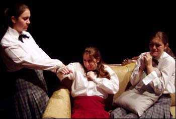 Left to right: Jennifer Pratt as "Mary," Carla Mitchell as "Peggy," and Jaime Pearsons as "Helen" play the game of intimidation in "The Childrens Hour."  Photo by Daniel Patterson.