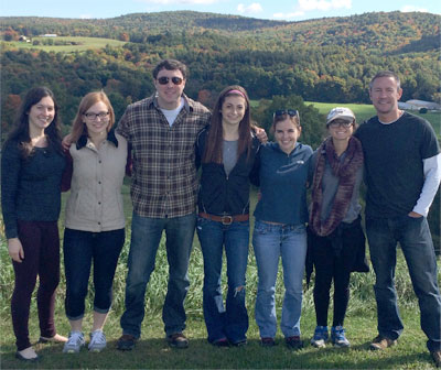 The research team on a downtime visit to Allyson's Orchards in Walpole, NH: (L–R) Aimee Joyce ’13 (lab alum), Emma Speaks (volunteer from Monadnock Regional High School), Brad Stubenhaus ’14 (research associate), Megan Beaudry (junior), Emily Neverett (senior), Alex Abbate (junior), Dr. Pellettieri. Not pictured: J.P. Dustin (senior), Maggie Kelly (senior), Caleb Larocca (junior), Derek Starkey (volunteer, UNH Class of 2013)