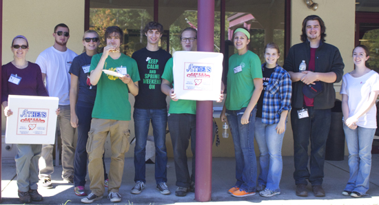 The volunteers at the entrance to the Monadnock Humane Society (l–r):  Associate Professor of Music Sandra Howard, Jarrett Hanwright (friend of Molly Schaefer), Molly Schaefer, Scott DeMeo, Dimitrios Kapoukranidis, Gabe Belluscio, Sheryl Magdycz, Amanda Williams, Nick Tocci, Kaitie Hart.