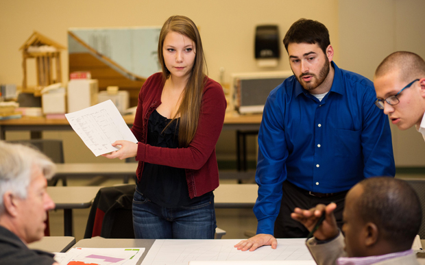 The Communicorps team sharing design ideas with Dr. Kagaba when he was on campus last November.