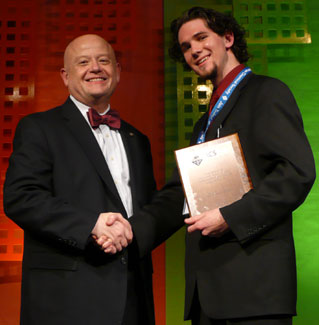 Courtesy photo; Joe Meany (right) receives an honorable mention award on behalf of the KSC Chemistry Lyceum from Dr. Thomas Lane, President of the American Chemical Society (ACS).