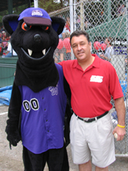 Bert Poirier (Admissions) threw out the first pitch at the Keene State Night at the Swamp Bats Game on June 20 (courtesy photo).