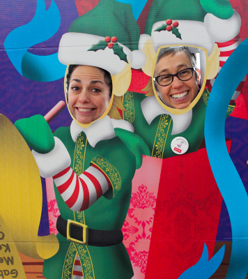 Amanda Warman and Diana Duffy pose as elves at the Winter Celebration