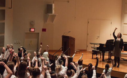 Dr. Howard leading the elementary singers in the morning large group warm up. (Amanda Williams photo)