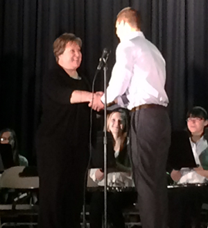 Kevin Lackie from KSC presenting Lisa Goodwin from Jaffrey-Rindge Middle School with the 2015 Scores Project award.