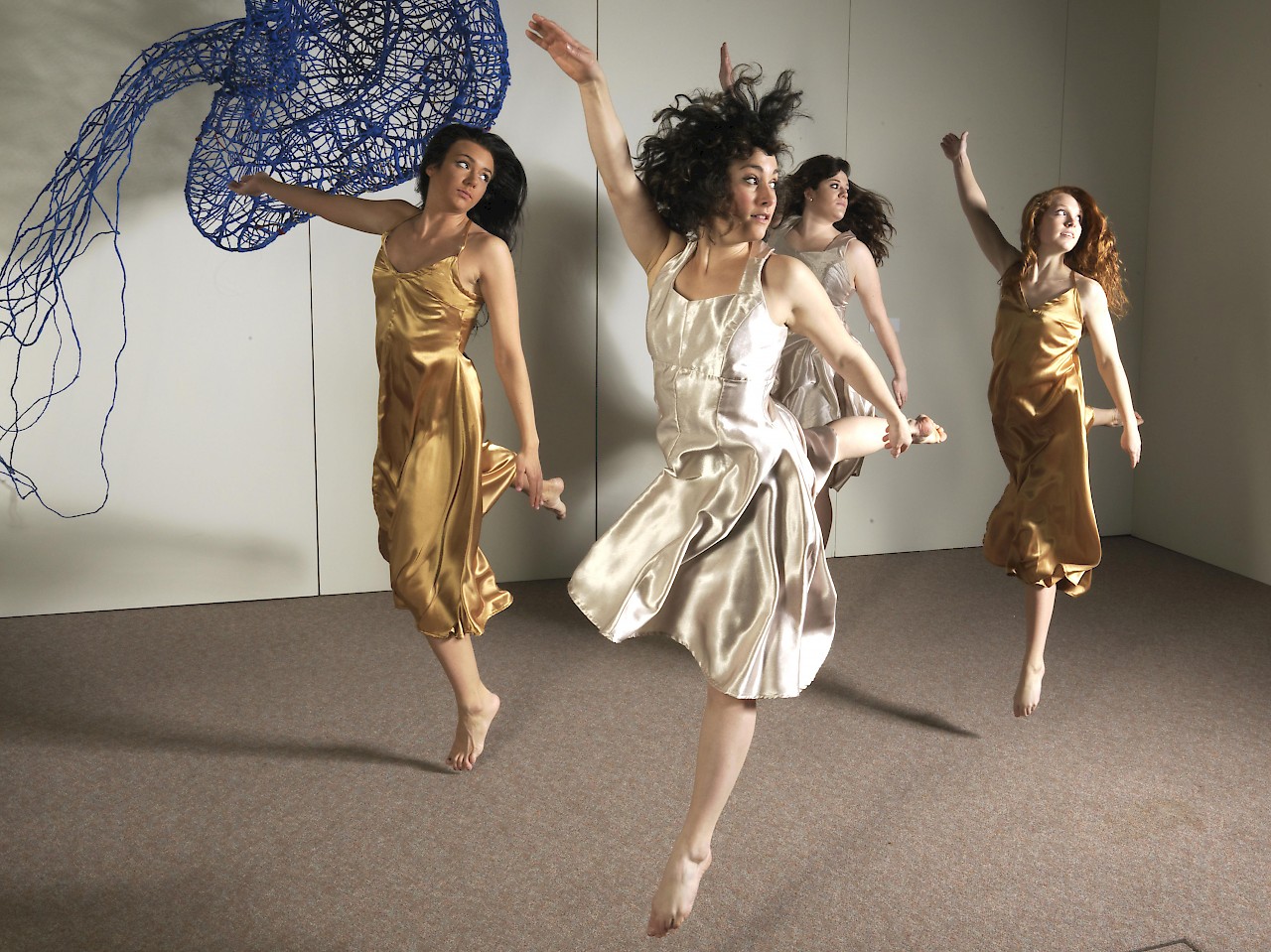 KSC dancers (from left) Emily Brochu, Abbie Brown, Alexa Deluca, and Nicolette Webber perform new modern dance works. Photo by Peter Roos.