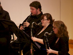 Students perform classical chamber music at the concert.