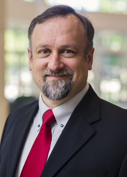 Patrick Dolenc, Professor of Economics and Barbara Burch Award winner