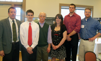 At the CommuniCorps ceremony in the Alumni Center (lr): Steve Fortier, Jamie Martin, Great River Co-op Board member Ben Daviss, Stacy Glover, Ramsey Mellish and Jedd Pellerin.