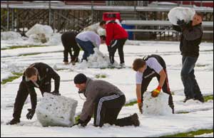 Keene State mens soccer team players clearing their field on Monday afternoon. (Courtesy: Chris Palermo)