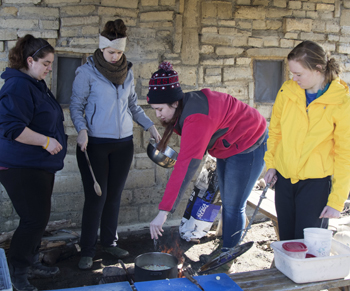 Students cooking at Heifer Farm