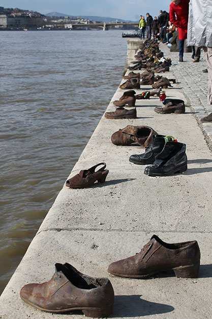 Budapest Shoes (Hungary) - During WWII, Jews were told to stand on the edge of the Danube River, step out of their shoes, and were shot in the water. This is a memorial in Budapest in honor of those who died this way. (Kayla Magan, Jagiellonian University - Krakow, Poland)