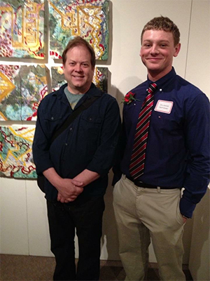 Seth Kaiser (right) and Prof. Paul McMullan in front of "Alchemy" at Emerging Art 2013