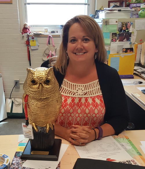 Deb Williams receives the Golden Owl.