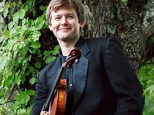 Mike Kelley, violist with Apple Hill String Quartet, performs at the Cohen Center lecture.