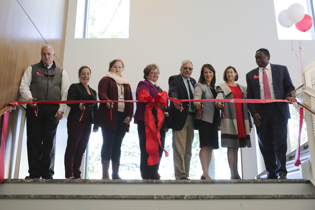 The ribbon is cut on the new Living and Learning Commons. Photo by Will Wrobel.