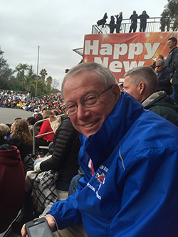 Andy Soucy ’72 checking out “TV Corner” in Pasadena, where the Lancers will march next year.