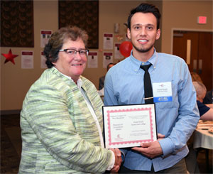 Daniel Keady receives 2017 President’s Leadership Award (photo: Gil Talbot)