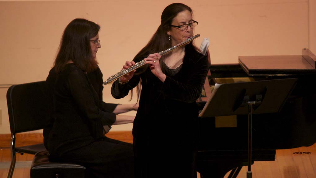 Faculty perform a woodwind recital.