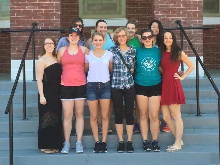 Katie Masso-Glidden, front row in white shirt, and fellow students on an alternative break trip to Selma, Alabama.