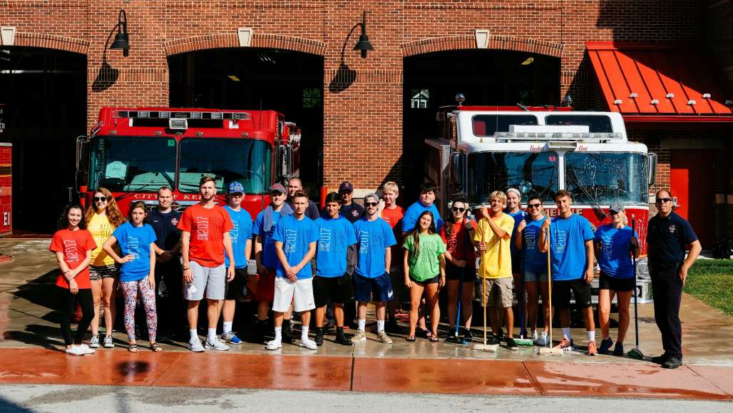 Group photo in front of the fire station