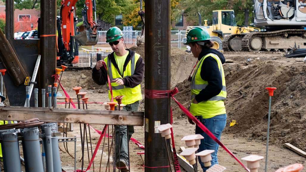 Two workers on construction site