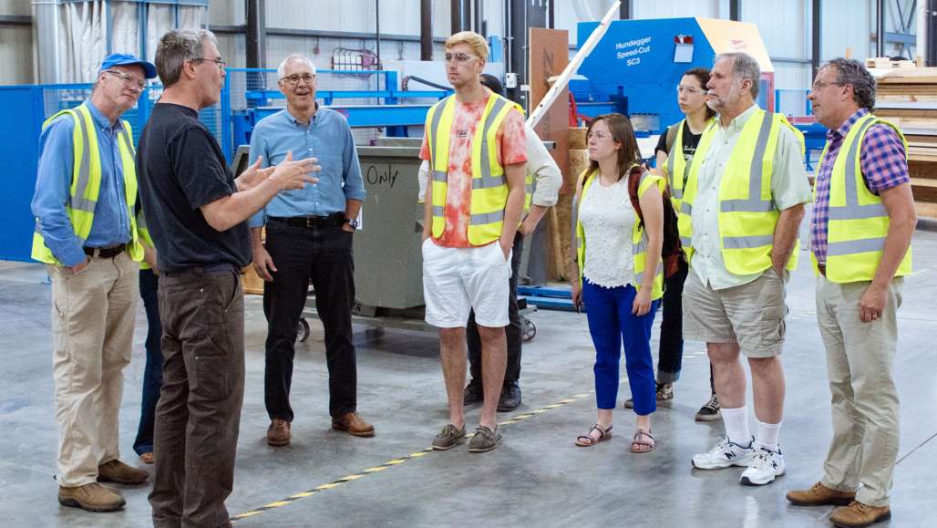 Students on a tour of the Unity Homes building facility in Keene.