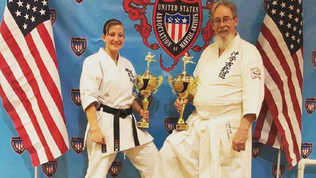 Amelia Gallup, left, on the podium