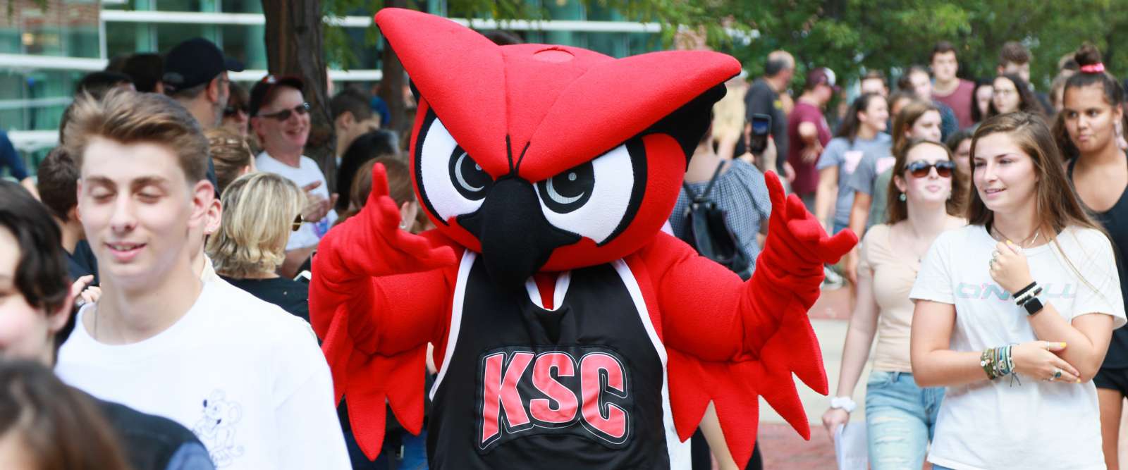 Hootie leads first-year students down Appian Way during Clap-In in August